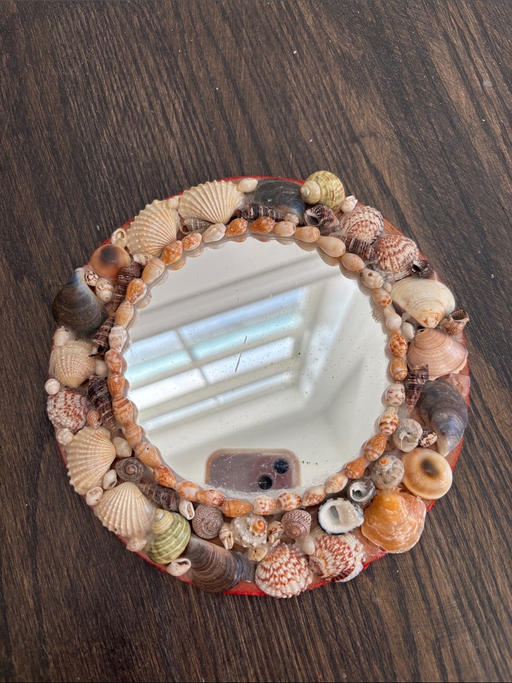 Vintage shell covered mirror, mix of colors/shapes, velvet back, 7.5”